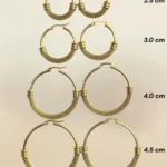 Argollas de Aro Redondas Con Detalle Trenzado